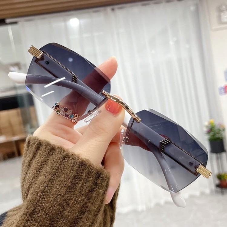 Damskie okulary przeciwsłoneczne Glamour bezramkowe prostokątne SKK-03