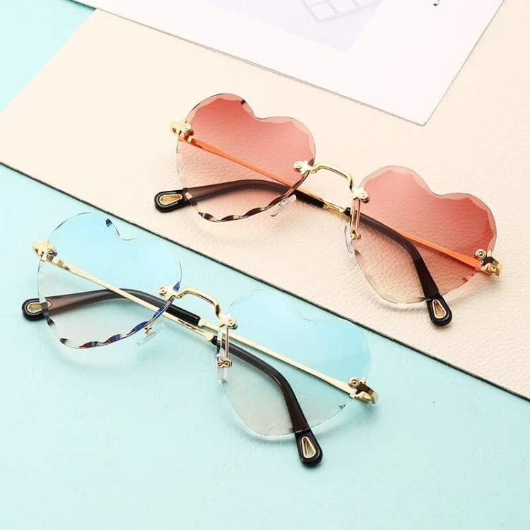 Damskie okulary przeciwsłoneczne Serca Glamour bezramkowe SKK-02D